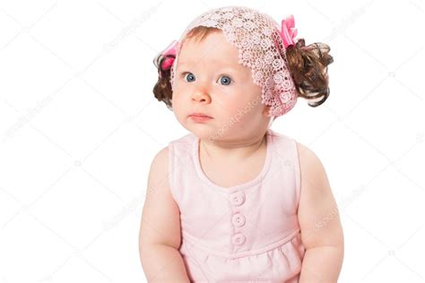 Adorable Little Baby Girl Playing In The Studio Isolated On White