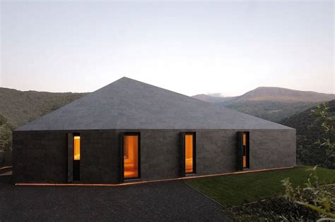 Prefab Swiss Alps House Designed To Look Like Boulder