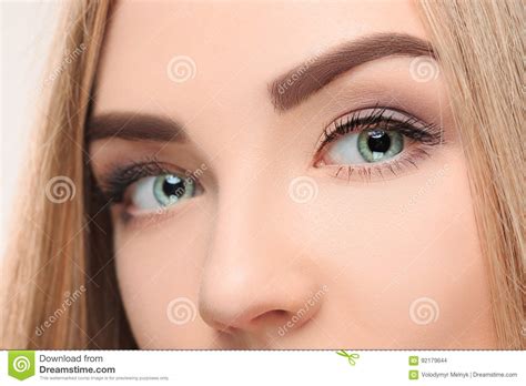 Beautiful Girl Face With Big Blue Eyes Stock Photo