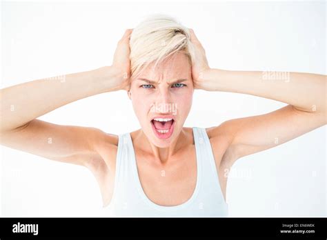 Angry Woman Screaming And Holding Her Head Stock Photo Alamy