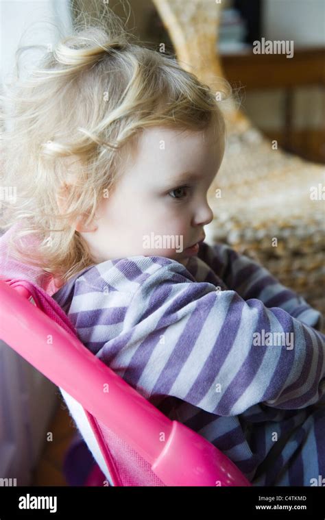 Toddler Girl Pouting Side View Stock Photo Alamy