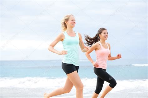 Runners Two Women Running Outdoors — Stock Photo © Maridav 44256307