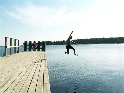 Free Jumping Into Water Stock Photo