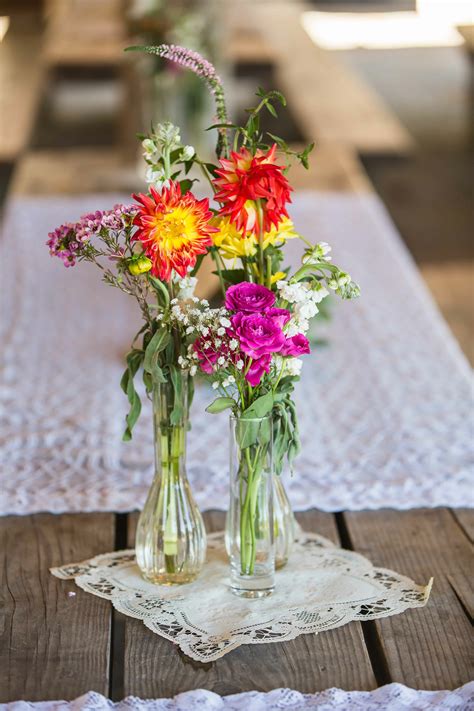 Colorful Wildflower Centerpieces In Glass Vases