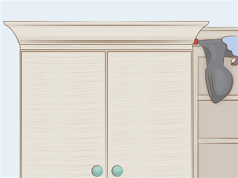Take a piece of molding larger than that measurement, lay it on your miter saw, on the left side of the blade. How to Cut Crown Molding for Cabinets: 12 Steps (with ...
