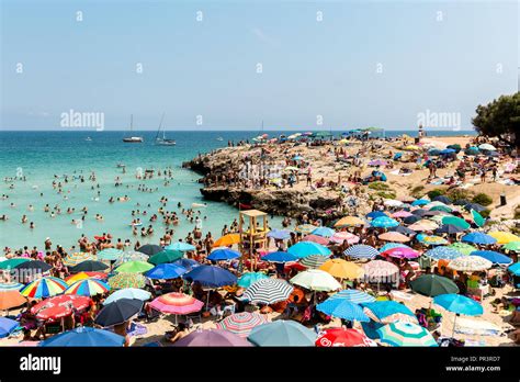 Busy Beach During August In Monopoli Puglia Italy Stock Photo Alamy