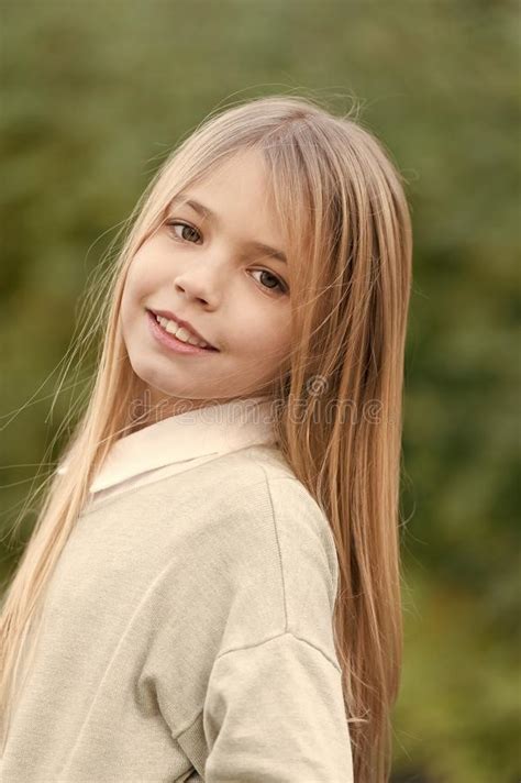 Little Girl Smile With Long Blond Hair Child With Cute Face Outdoor