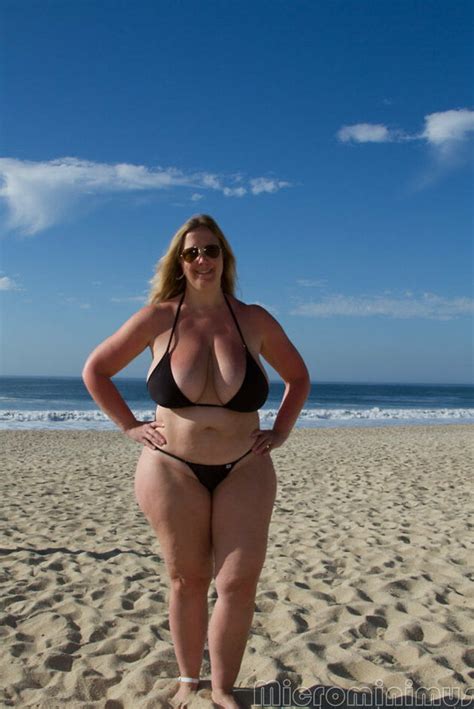 Curvy Blonde With Huge Boobs In A Tiny Bikini Porno Photo