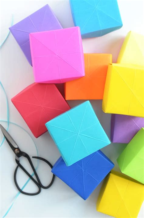 Download the free pattern and customize them to your heart's cut it out along the solid lines and be sure to cut through the extra line on the side. Alice and LoisDIY Paper Boxes - Alice and Lois