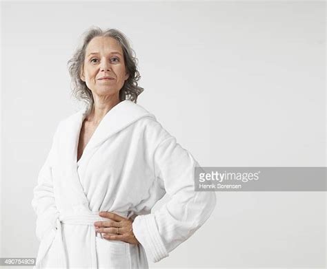 Woman Wearing White Robe Photos And Premium High Res Pictures Getty Images