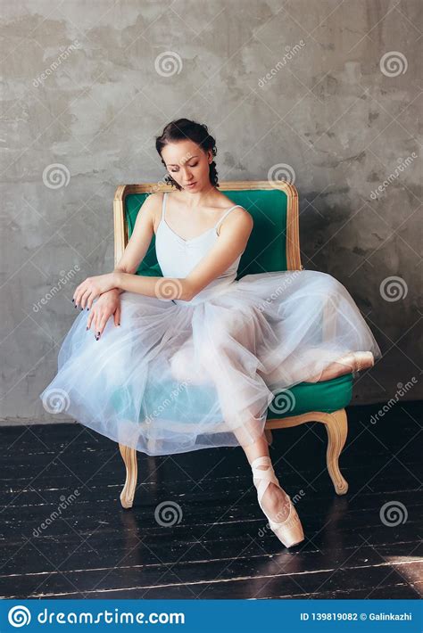 Ballet Dancer Ballerina In Beautiful Light Blue Dress Tutu Skirt Posing