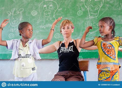White Caucasian Woman Teaching Black Children In Africa Editorial Stock