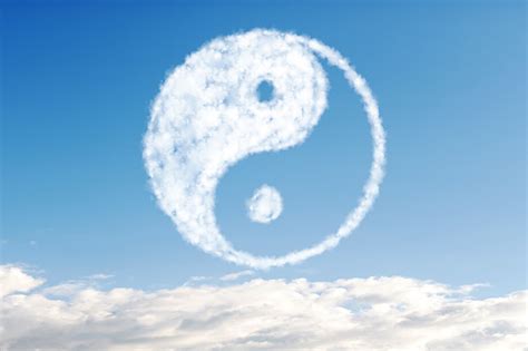White Cloud On A Background Of Blue Sky In The Shape Of Yin Yang Stock