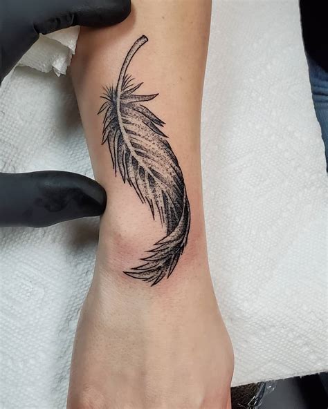 101 Amazing Feather Tattoo Designs You Need To See Outsons