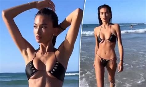 Kelly Gale Shows Off Her Jaw Dropping Cleavage And Six Pack Abs As She Struts Through The Water