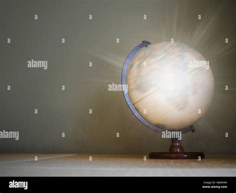 Light Effect On Spinning Globe Model Stock Photo Alamy
