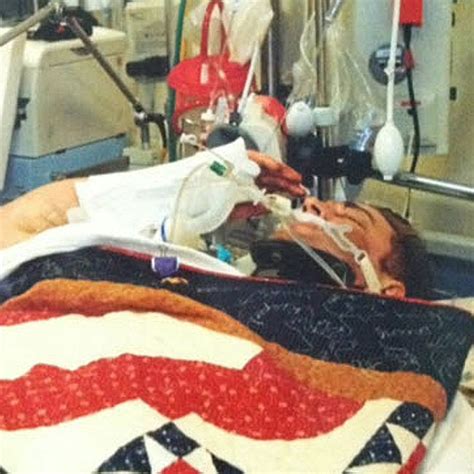 Soldier Thought To Be Unconscious Salutes Upon Getting Purple Heart