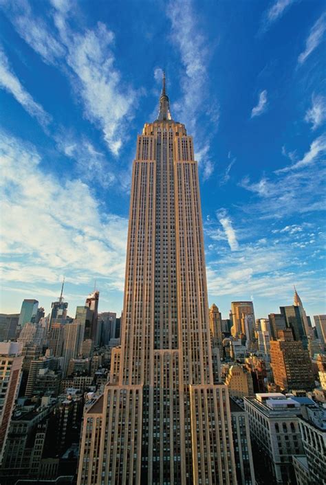 An Aerial View Of The Empire State Building In New York City With Blue