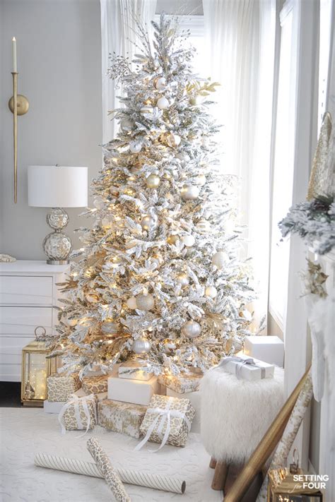Video i 4k och hd för alla nle omedelbart. Elegant Gold and White Flocked Christmas Tree - Setting ...