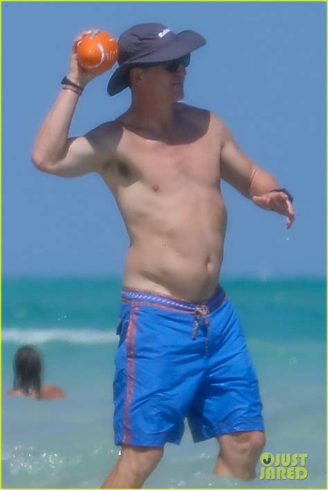 peyton manning flaunts ripped abs while shirtless at the beach photos photo 4492976 bikini