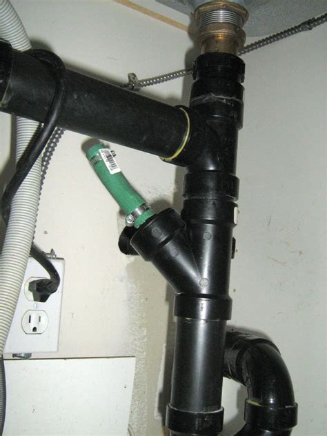 Garbage disposal devices installed under kitchen sinks usually have a port for connecting a dishwasher hose. Double Kitchen Sink with Garbage Disposal and Dishwasher ...
