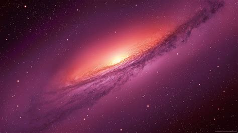 An Image Of A Purple Galaxy With Stars In The Background