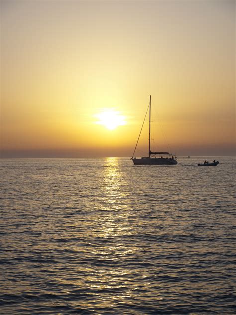Free Images Sea Coast Ocean Horizon Sunrise Sunset Boat Sunlight Morning Dawn Dusk