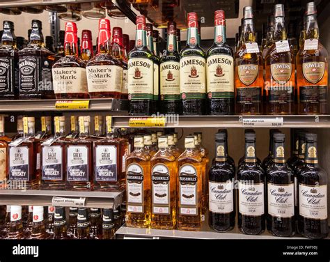 Bottles Of Alcohol On The Shelves Of A Liquor Store Stock Photo Alamy