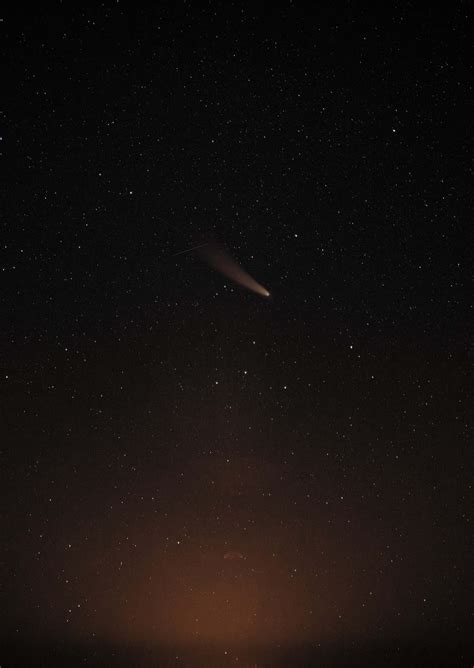 Download Majestic Comet Traversing The Night Sky Wallpaper