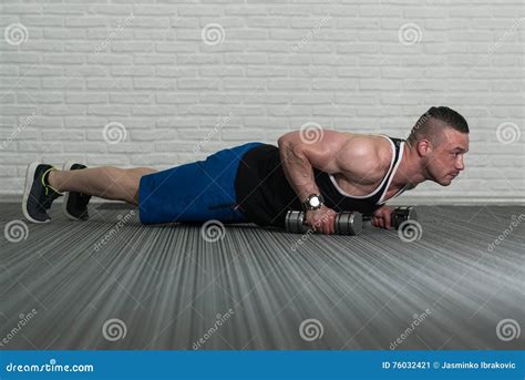 Push Ups With Dumbbells Stock Image Image Of Attractive 76032421