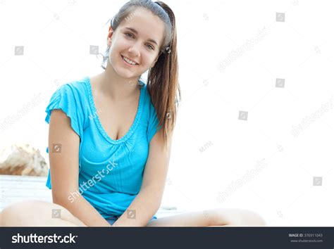 Portrait Attractive Adolescent Girl Sitting By Stock Photo