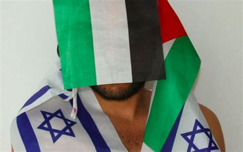 Gay Arab Activist Wraps Himself In The Flags The Times Of Israel