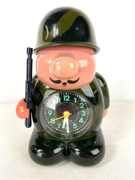 Duck House Military Soldier Quartz Alarm Clock Buggle Sound Helmet Push