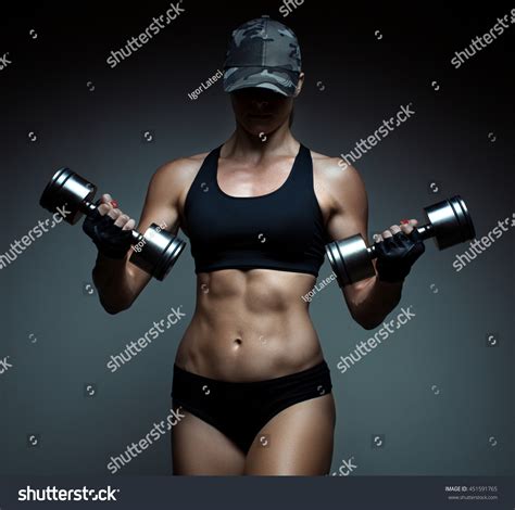 Strong Fitness Woman Bodybuilder Tanned Body Stock Photo