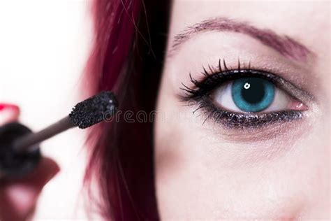Woman Applying Mascara On Eyelashes Stock Photo Image Of Women Comb