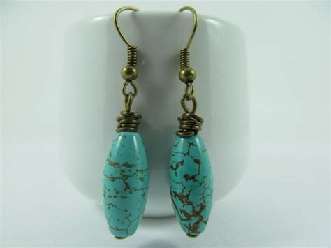 Items Similar To Turquoise Dyed Magnesite And Bronze Earrings On Etsy