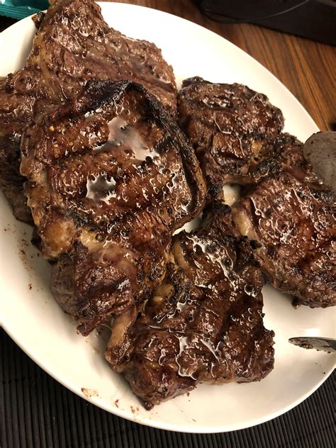 These steaks come from the top of the cow where the ribs are: homemade BBQ rib eye steaks rubbed with onion, garlic,s ...