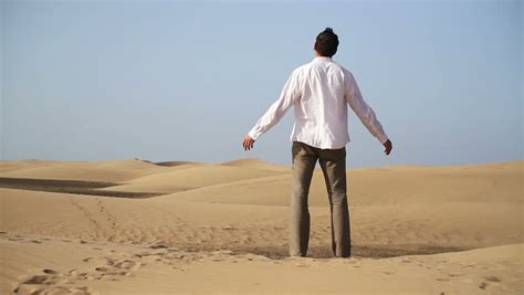 Lonely Man Standing In The Desert Stock Footage Video 2209585