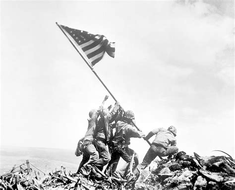 was the famous raising the flag at iwo jima photograph staged