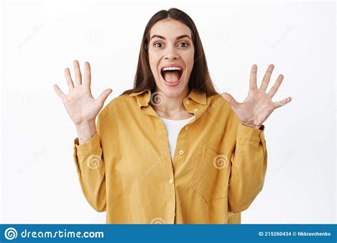 Image Of Happy And Excited Woman Raising Hands Up And Screaming Joyful