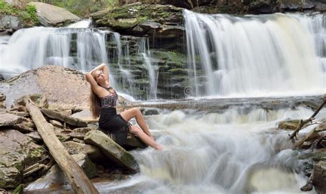 Beautiful Female Model Posing In Front Of Waterfall Stock Image Image