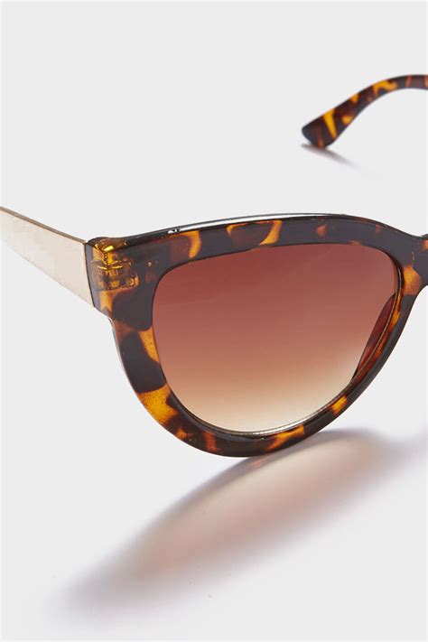 Tortoiseshell Cat Eye Sunglasses With Gold Tone Arms And With Uv 400