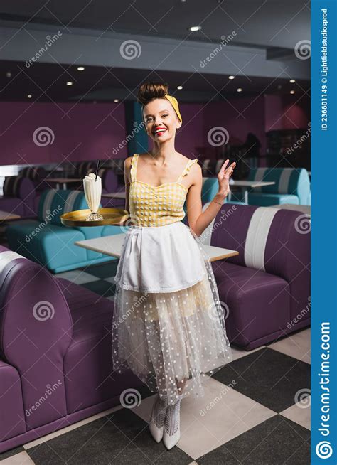 Cheerful Pin Up Waitress Holding Tray Stock Image Image Of Brunette