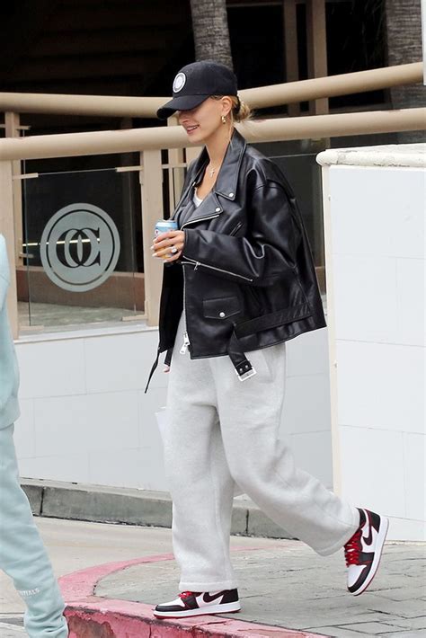 Hailey Bieber Rihanna And More Stars In Air Jordans Tracksuit Outfit