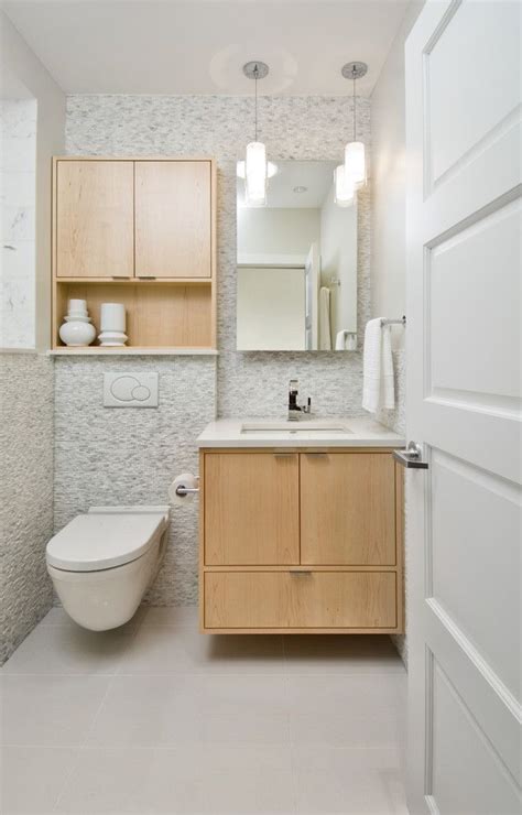This highly functional bathroom artfully combines everything you need into one small area. Cabinets to Get Dressing Room Wall Cabinet Design Ideas ...