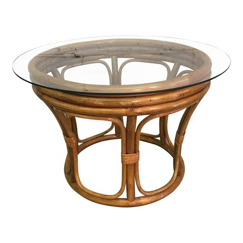 Many glass top coffee tables features a wood or metal base. Rattan & Glass Top Coffee Table | Chairish