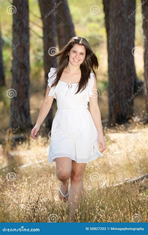 Happy Young Woman In White Dress Walking In Nature Stock Photo Image