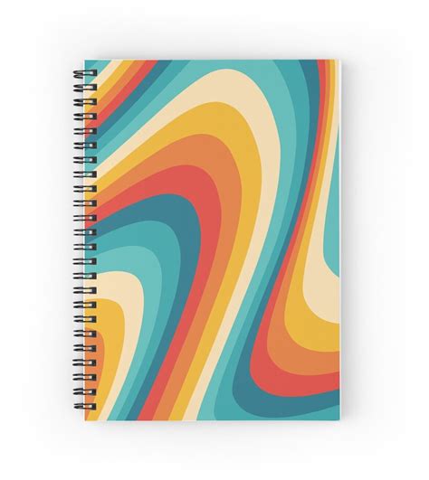 A Spiral Notebook With Colorful Swirls On It