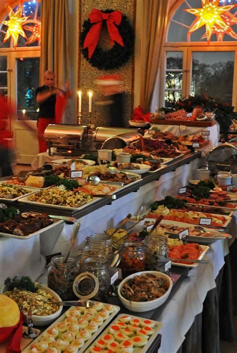A Buffet Table Filled With Lots Of Food