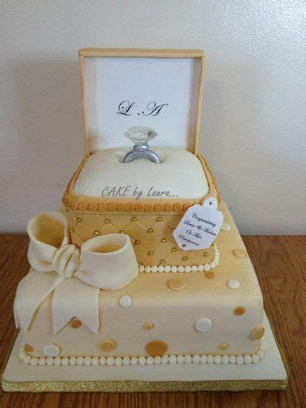 Not my original design, thank you to toni from sweet sugar treats for allowing me to recreate it! Gold ring box ~ all cake. So pretty! Great fondant work ...